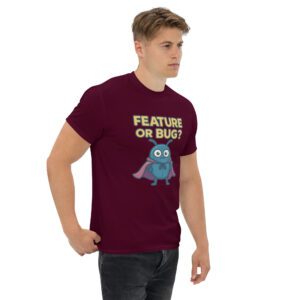 Maroon t-shirt with Feature or Bug software engineer humor design and cute bug graphic